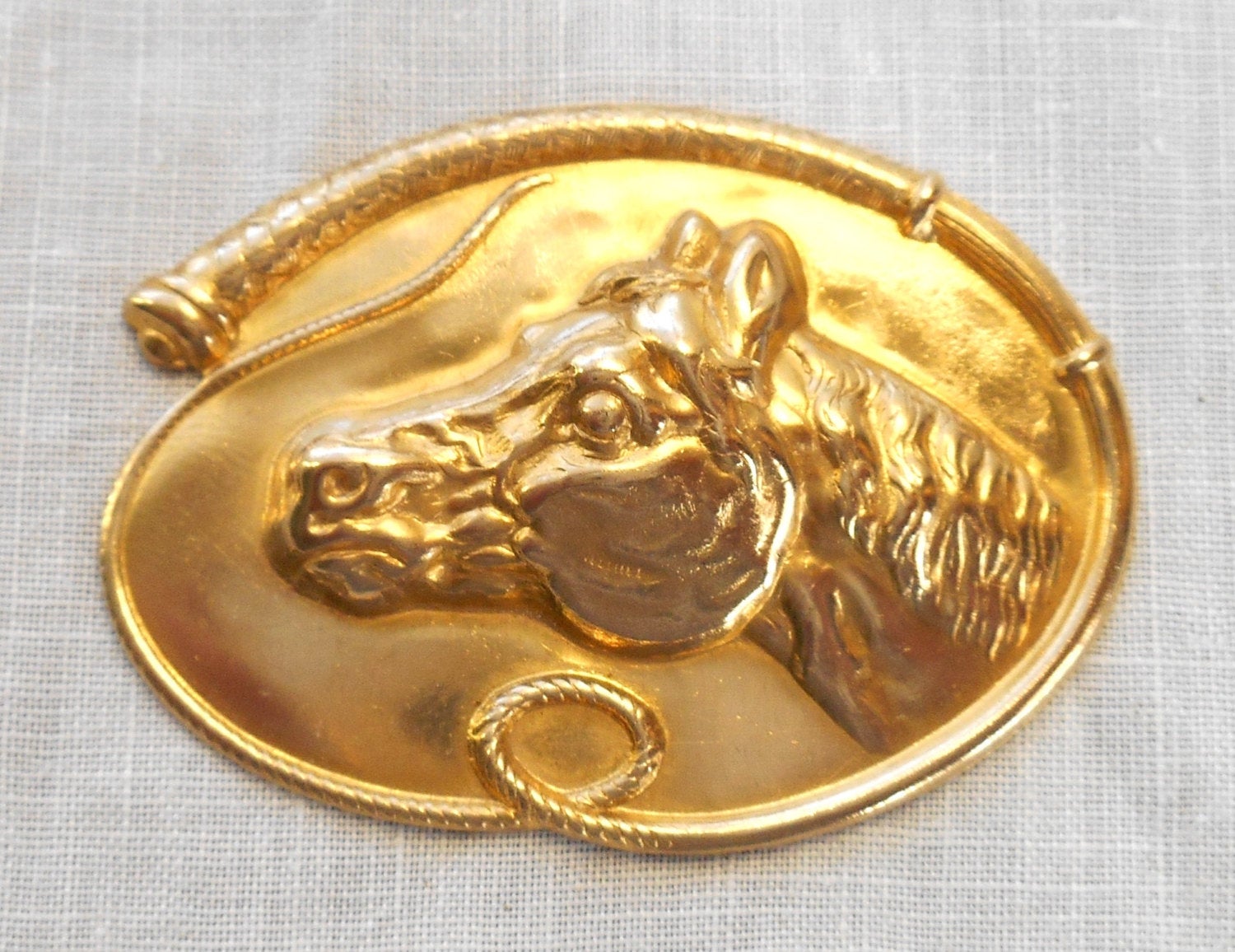 1 large raw brass stamping, a horse's head within a whip, a pendant, charm, connector, ornament, 52mm by 37mm USA made 6501 - Glorious Glass Beads