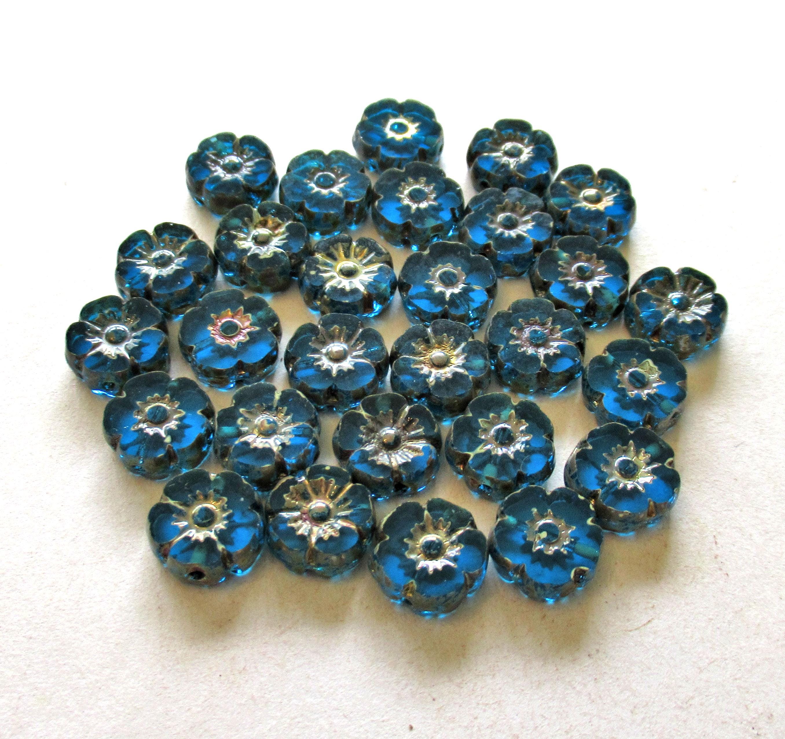 Ten Czech glass flower beads - 10mm - transparent capri blue picasso Hawaiian hibiscus flowers - table cut carved floral - C00101