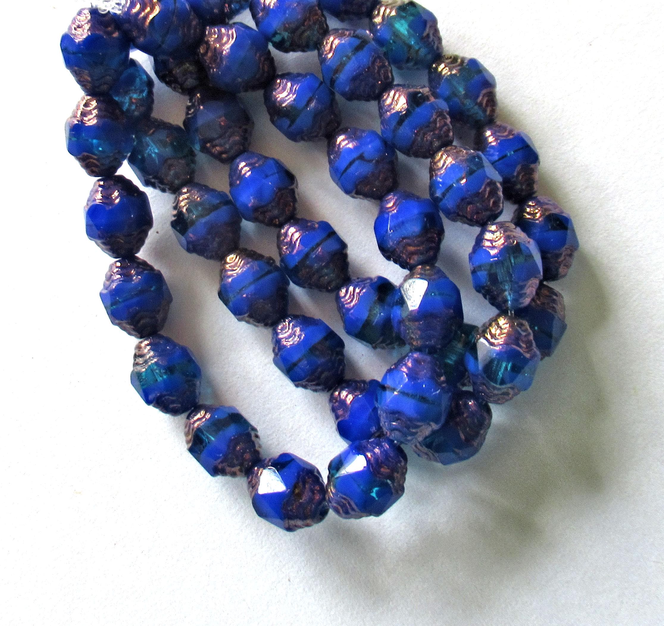 15 Czech glass mini antique style faceted oval beads - 8 x 6mm - blue mix with bronze accents - cathedral beads - C00892