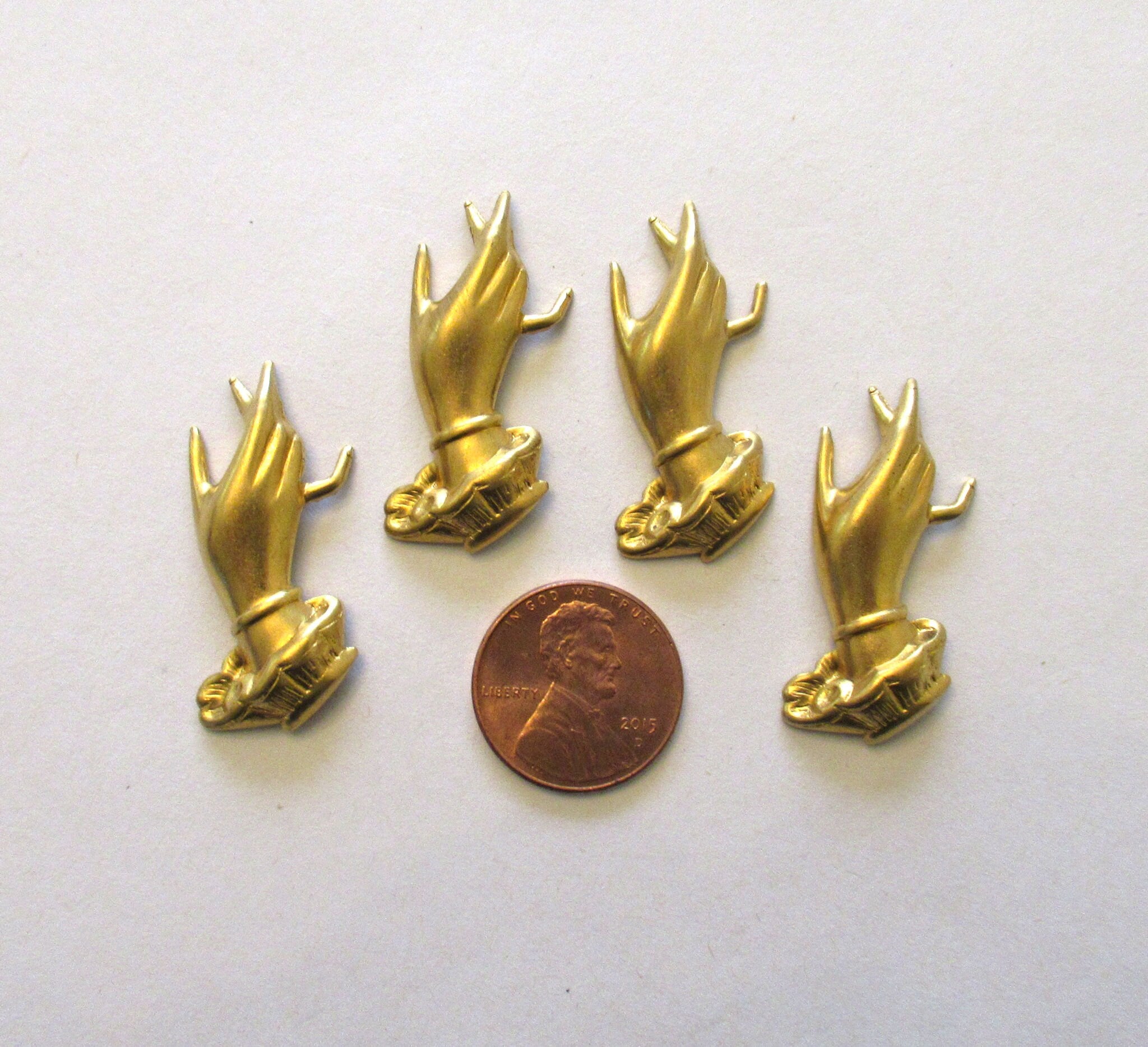 4 Victorian hand raw brass stampings - pendants - charms - ornaments 1.25" in by .5" inches - made in the USA 5401
