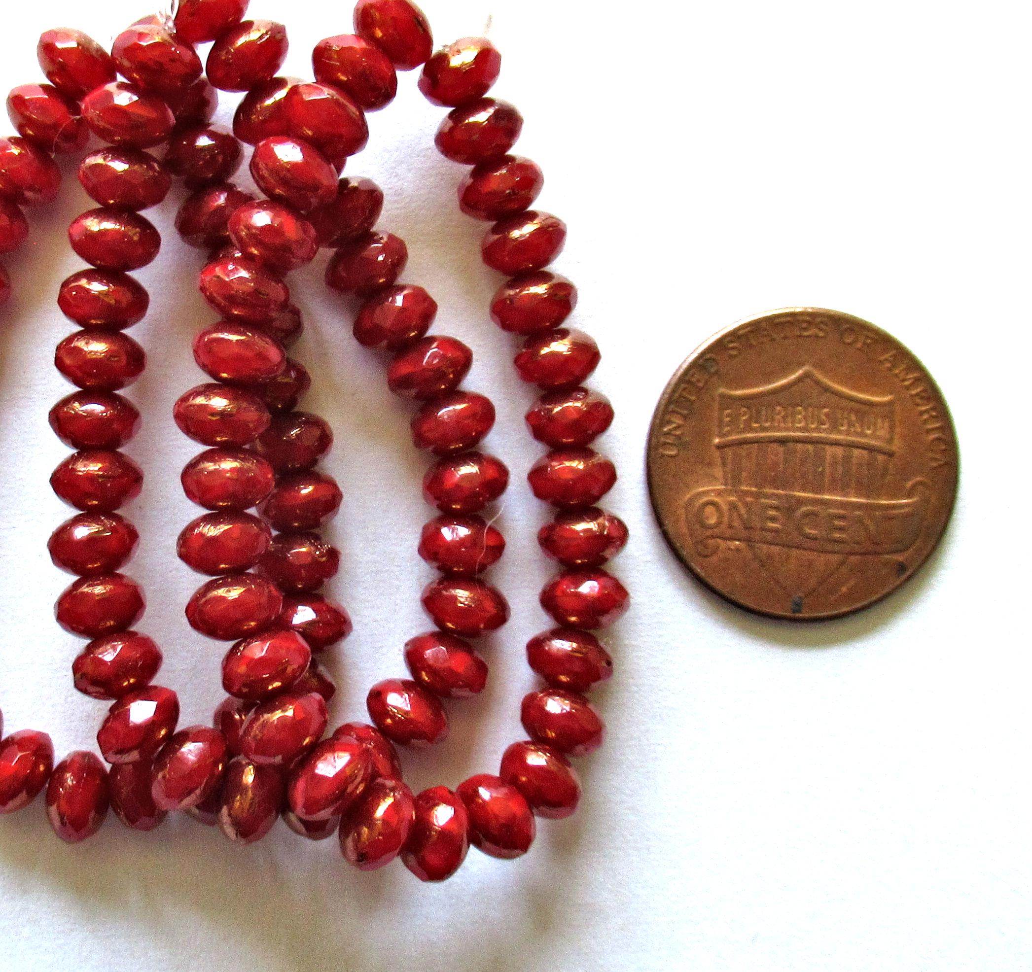 30 small Czech glass puffy rondelle beads - 3mm x 5mm - deep red with bronze accents - faceted fire polished - 00041