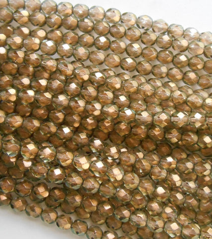 25 6mm Halo Linen Czech glass , Green glass over Gold firepolished, faceted round beads with a C2925