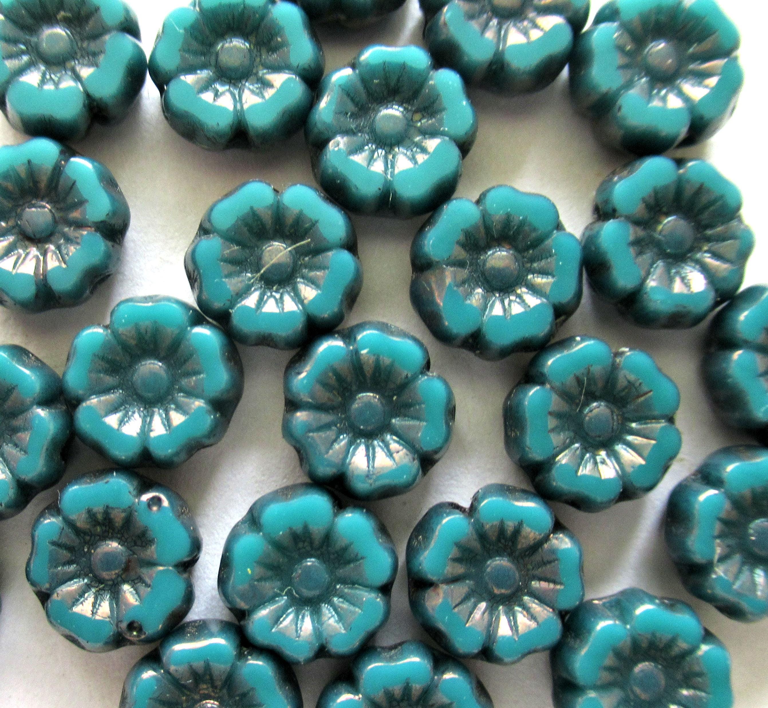 12 small 7mm Czech glass flower beads - teal or Persian turquoise blue green Hawaiian flowers w/ bronze accents - table cut - beads C00071