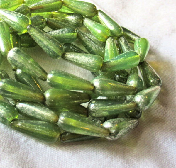 Lot of ten Czech glass teardrop beads - translucent green opal with a silvery mercury finish - 6 x 15mm elongated tear drops 82106