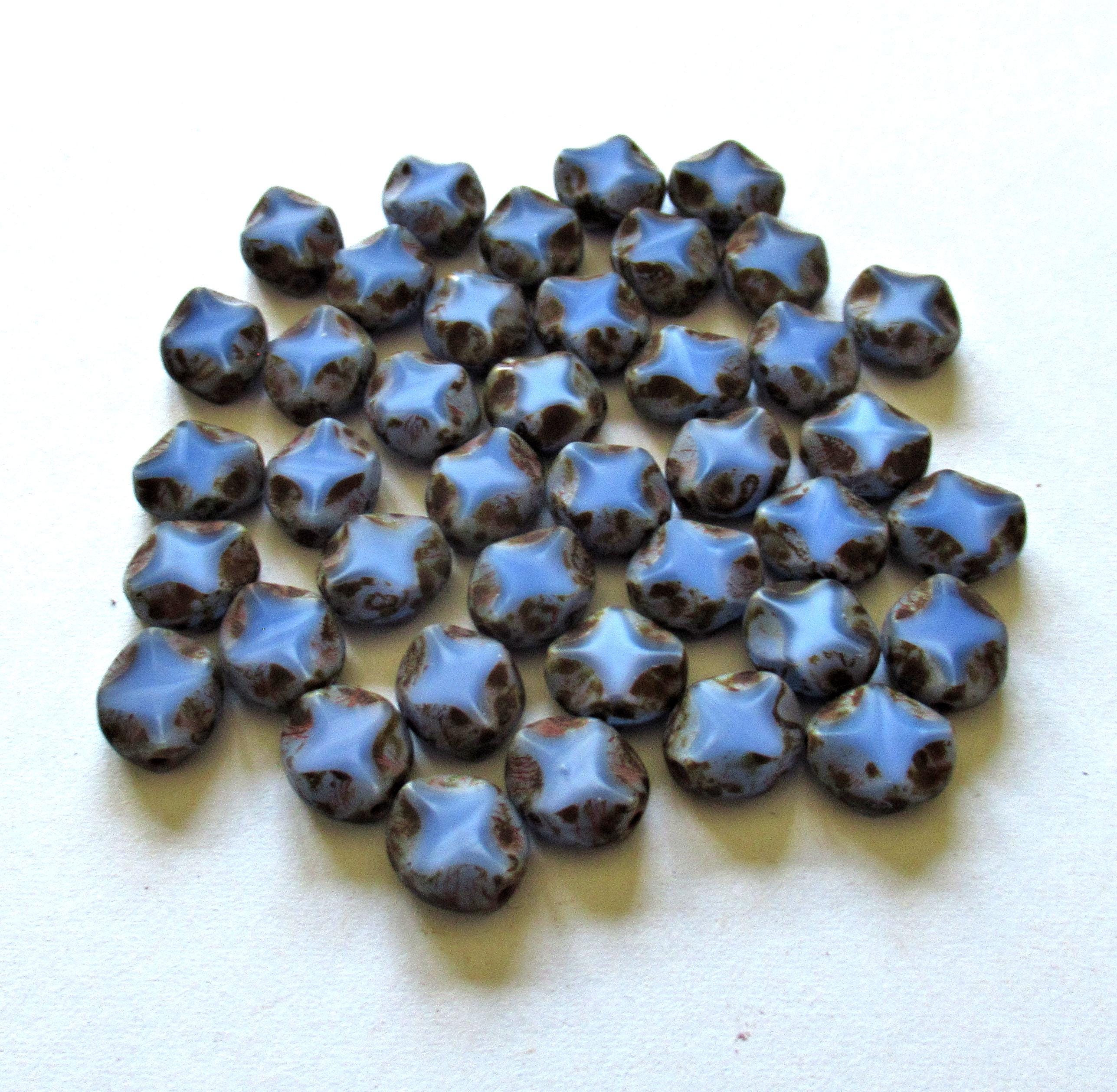 10 Czech glass oval beads - 9 x 8mm - blue w/ picasso accents - carved table cut beads with a diamond pattern - C0121