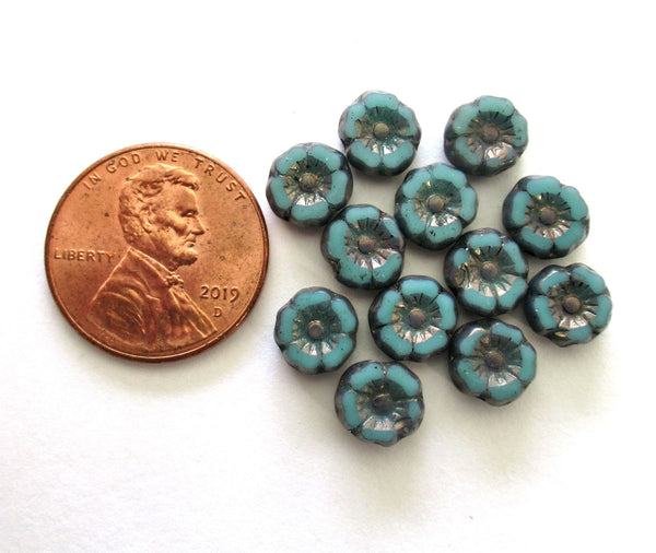 12 small Czech glass flower beads - 7mm opaque turquoise blue Hawaiian flowers w/ bronze picasso accents - table cut, carved beads C00911