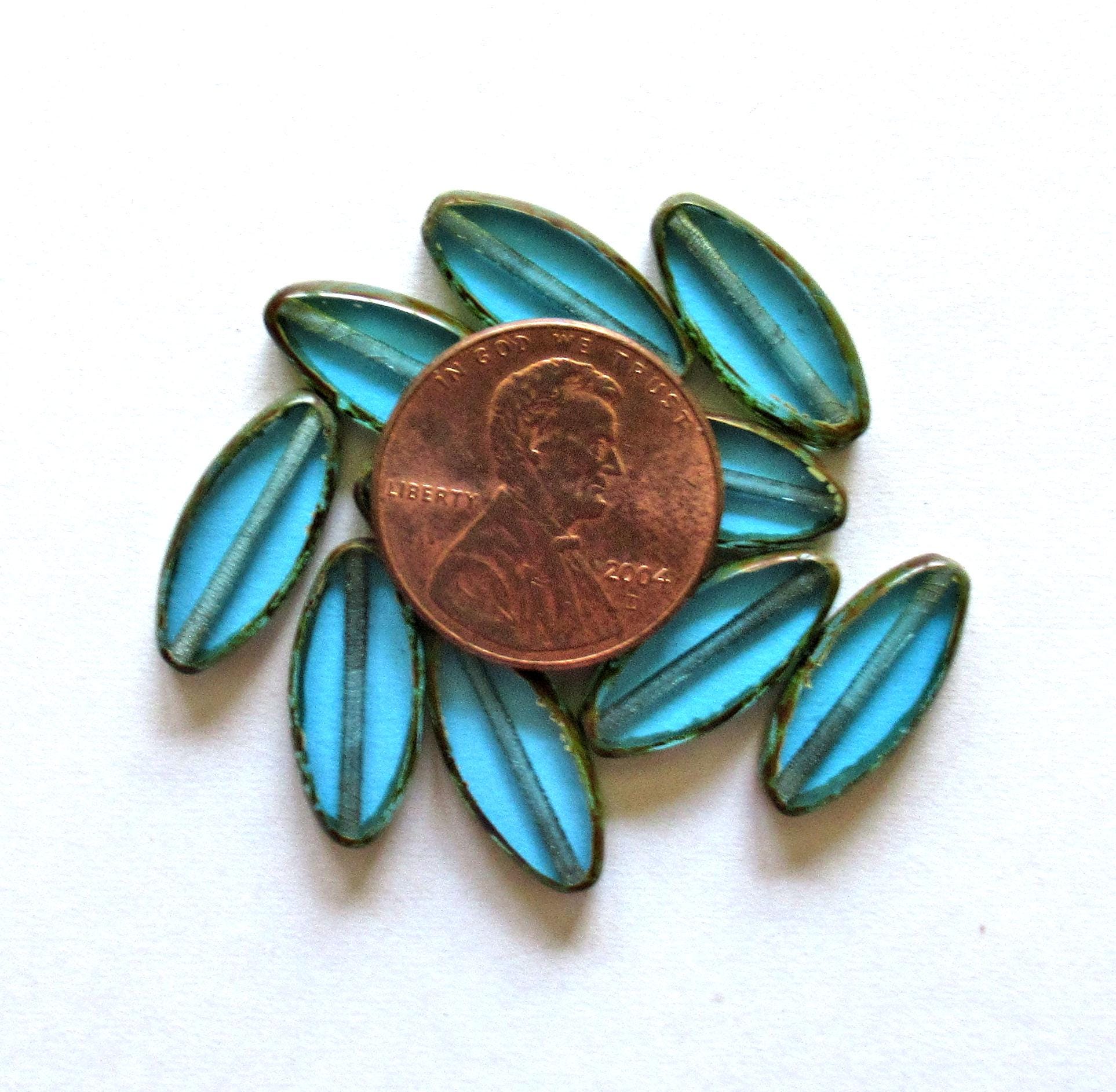 Ten Czech glass spindle beads - transparent aqua blue - 18 x 7mm - table cut beads - C00052