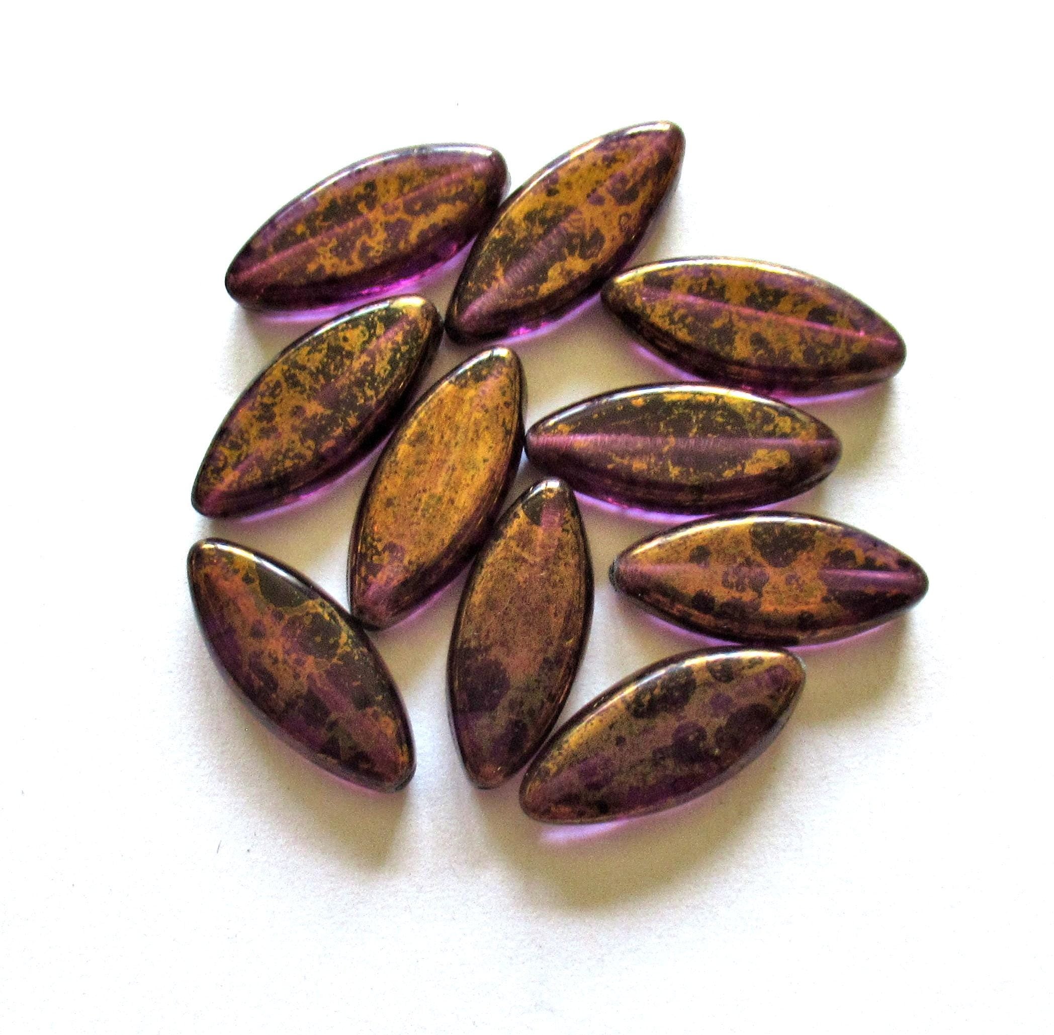 Ten Czech glass spindle beads - 18mm x 7mm - amethyst or purple with a splotchy bronze finish - table cut beads C00522