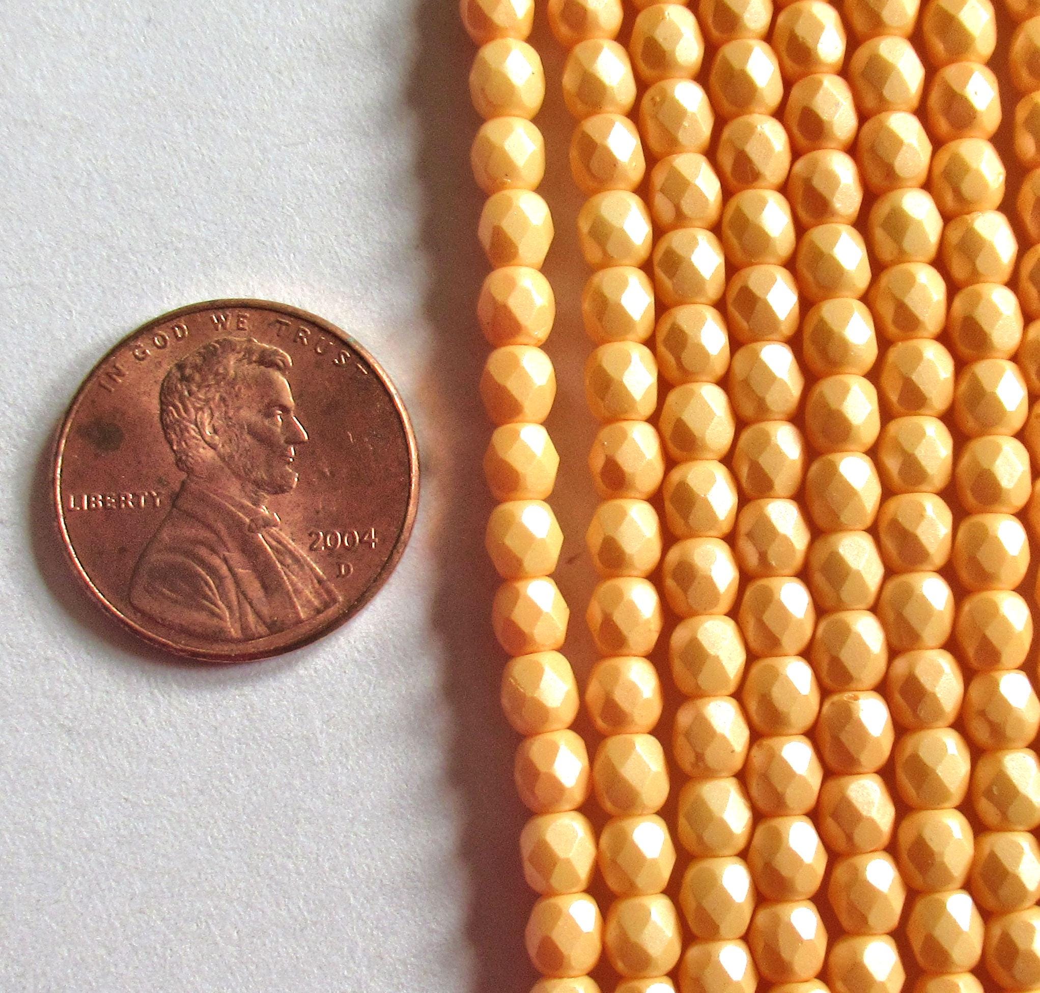 50 4mm Czech glass beads - powdery pastel orange -faceted round beads - C0018