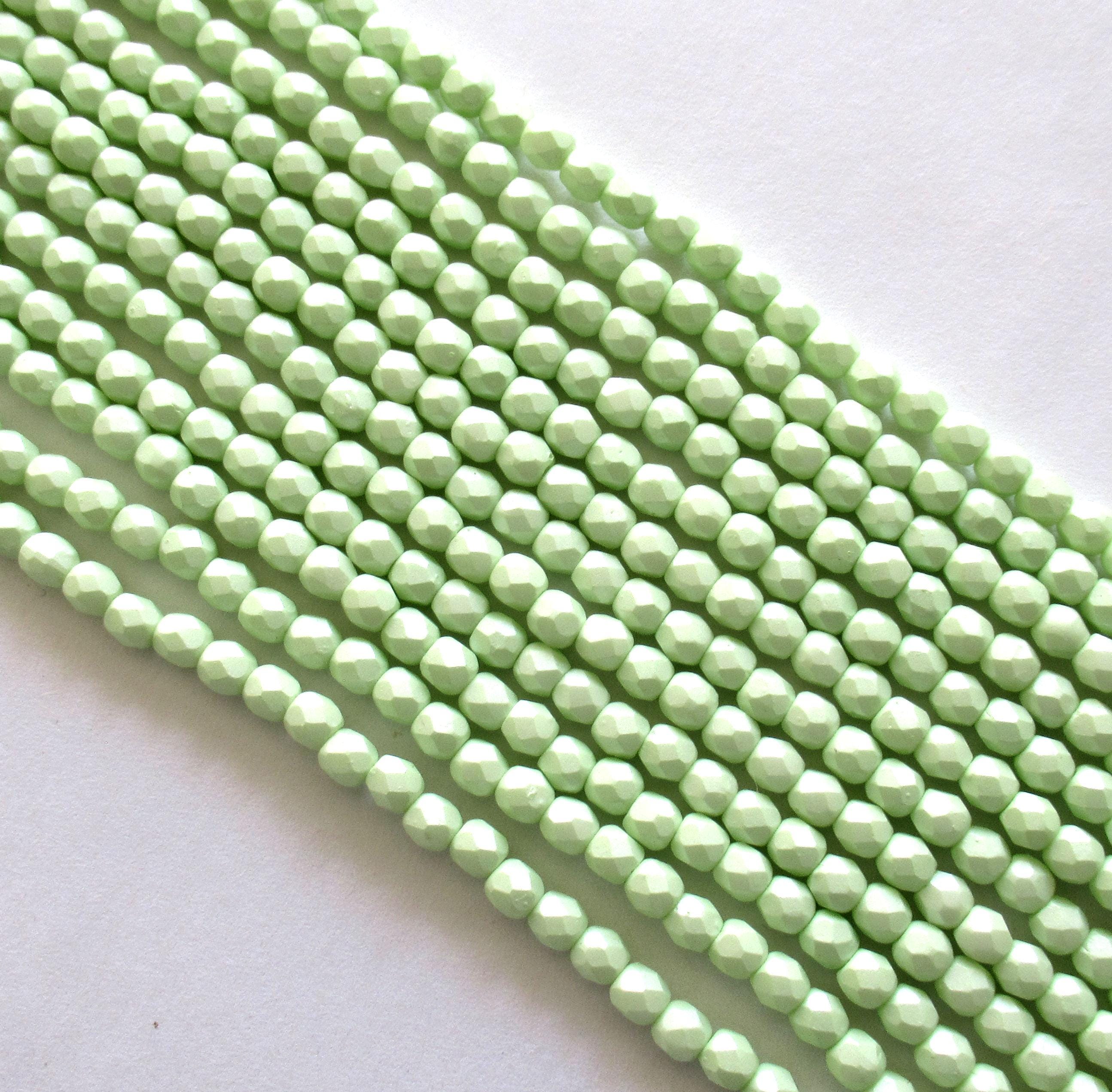 50 4mm Czech glass beads - light powdery pastel lime green - fire polished faceted round beads - C0056 - Glorious Glass Beads