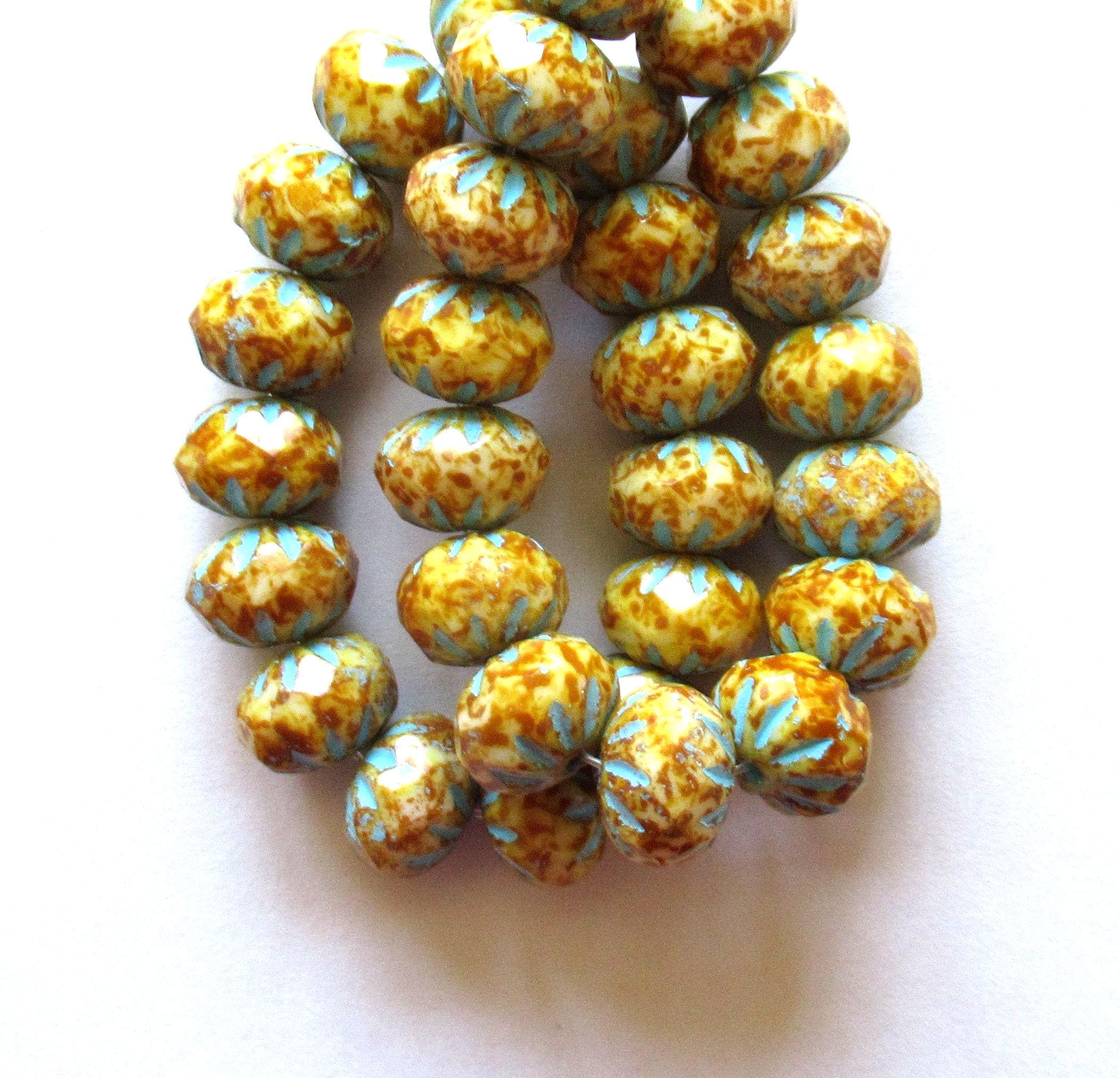 Ten Czech glass cruller beads - 7 x 10mm - off white w/ full picasso coat & blue wash - carved faceted rondelles - 00002