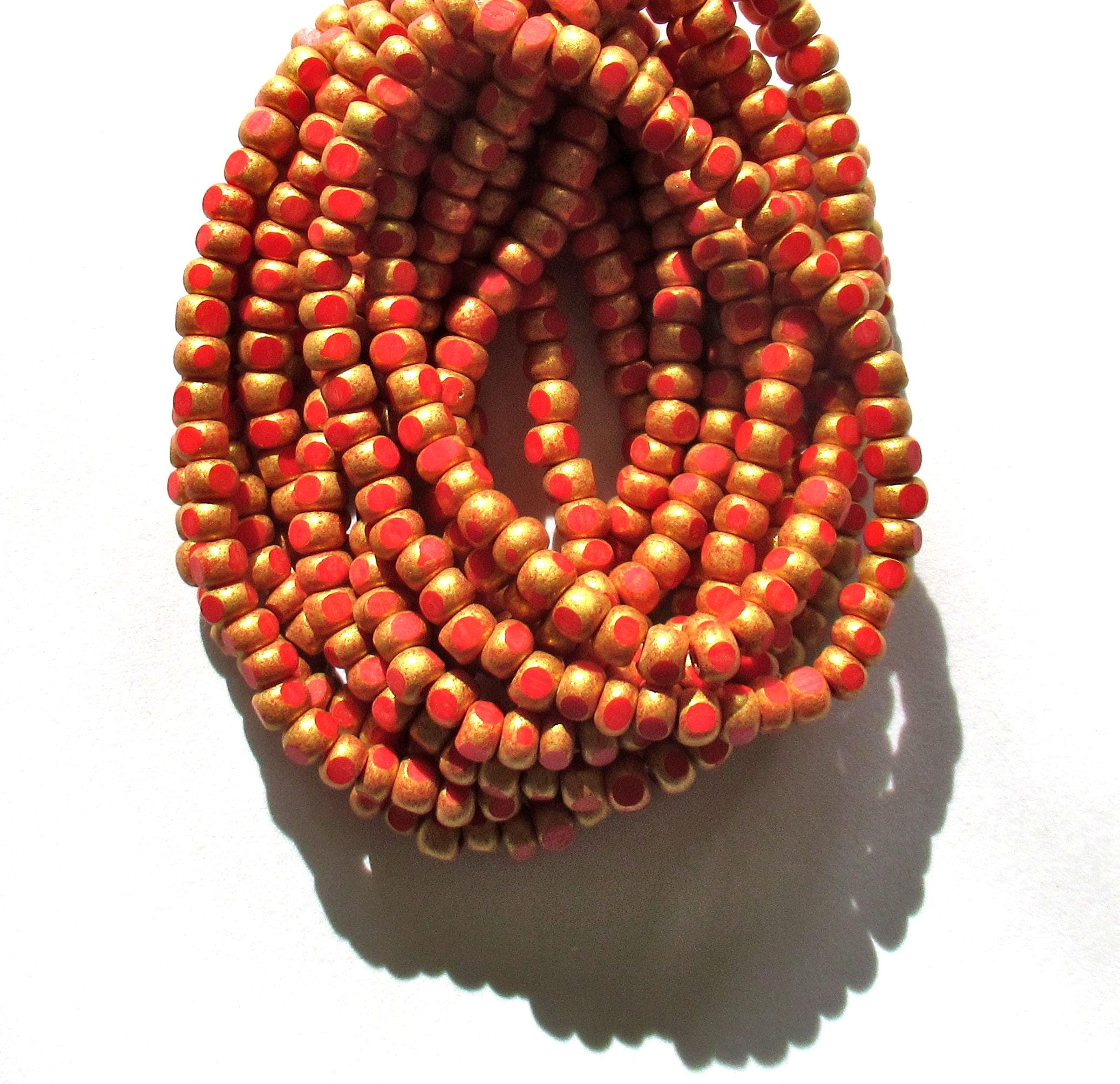 50 4 x 3mm Czech glass Tri-cut beads - opaque bright red w/ gold accents - 6/0 faceted seed beads - C00141