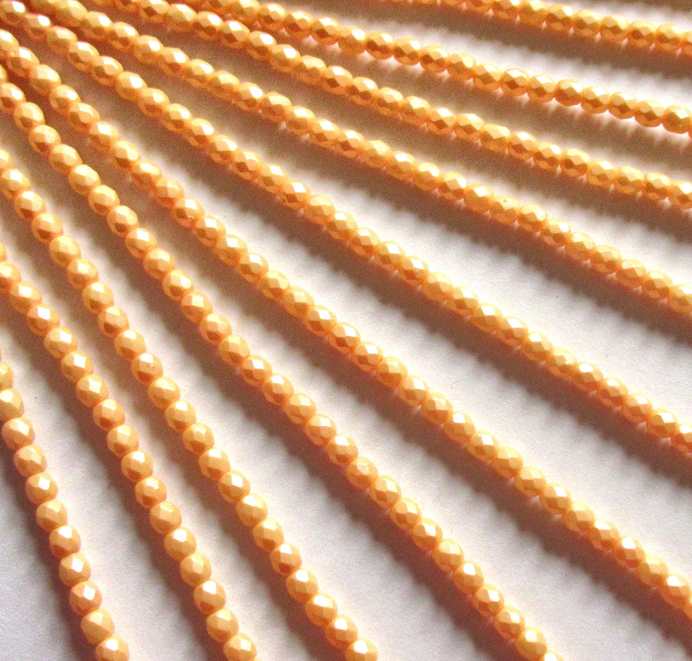 50 4mm Czech glass beads - powdery pastel orange -faceted round beads - C0018