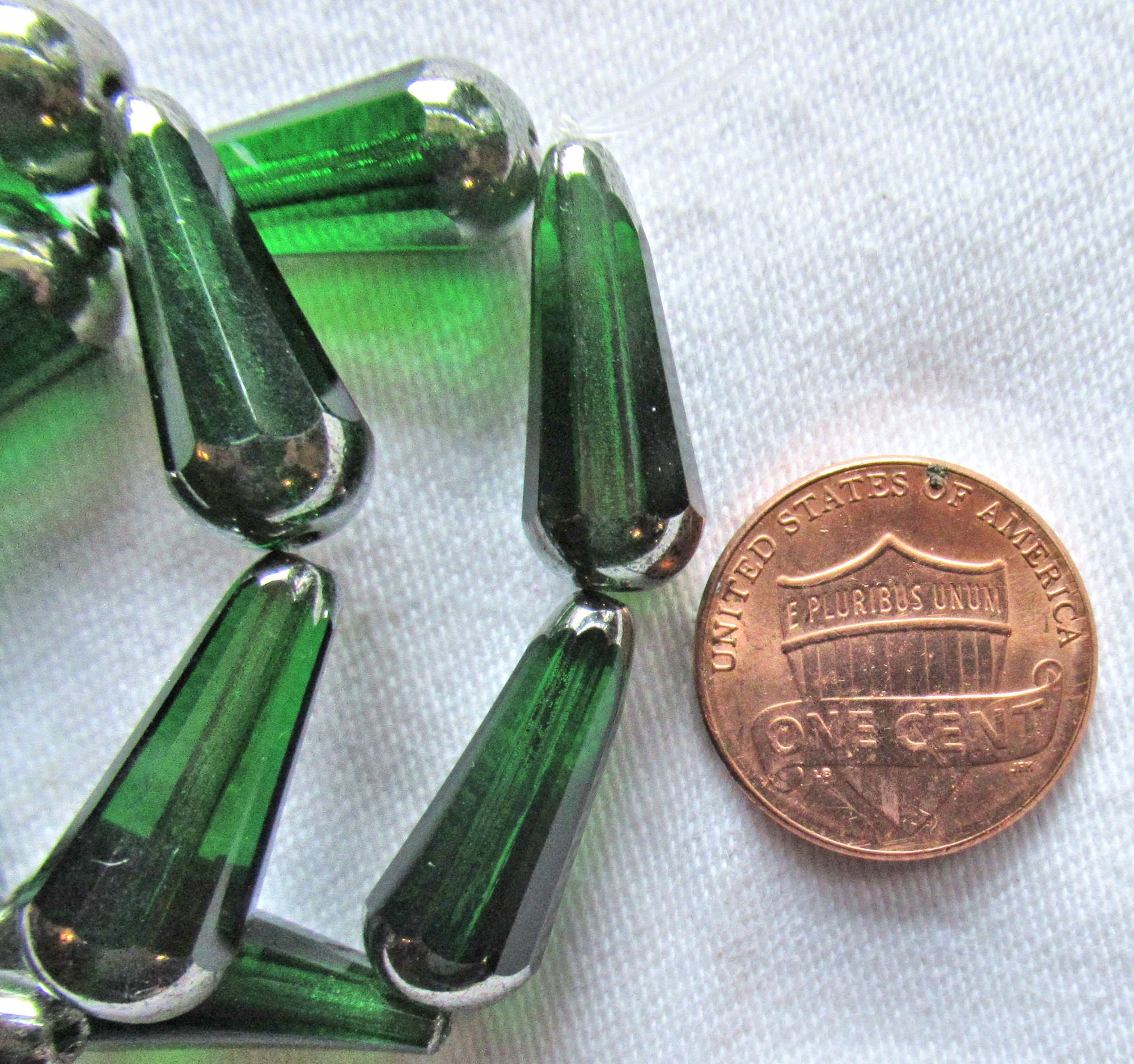 Six Czech glass long faceted teardrop beads - transparent emerald green w/ a silver finish on the ends - 9 x 20mm elongated tear drops 43206