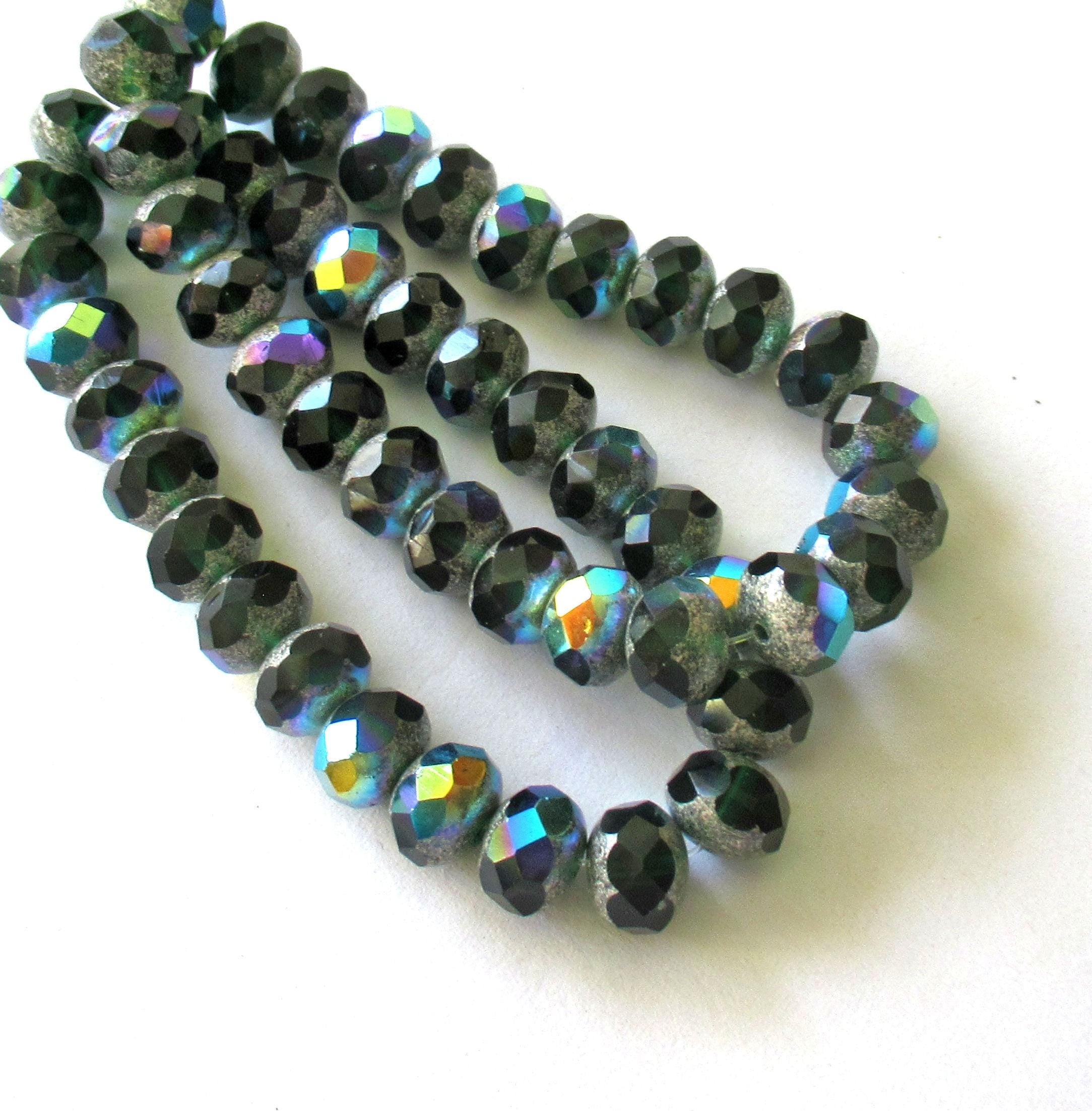 25 Czech glass puffy rondelle beads - 8 x 6mm - transparent dark emerald or forest green w/ silver & ab accents - 00362