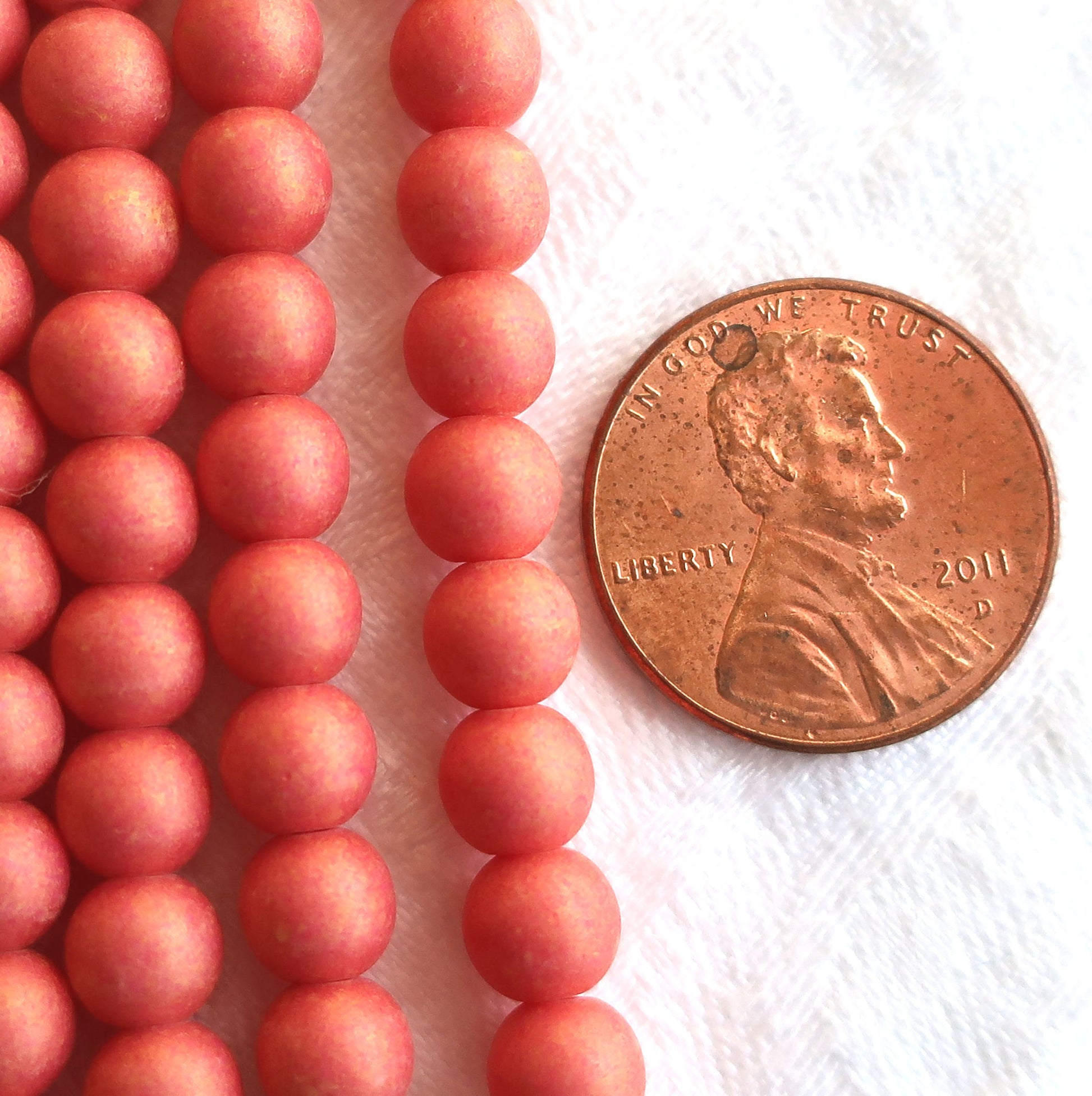Lot of fifty 5mm Pacifica Watermelon red, pink, Czech glass druks - pressed glass, smooth round druk beads C03101 - Glorious Glass Beads