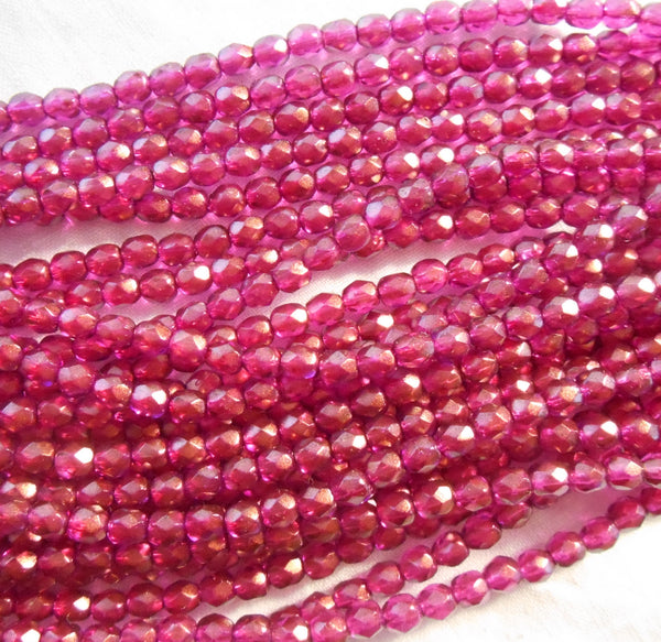 50 4mm Halo Madder Rose Czech glass beads, deep pink firepolished, faceted round beads with a transparent gold finish, C60150
