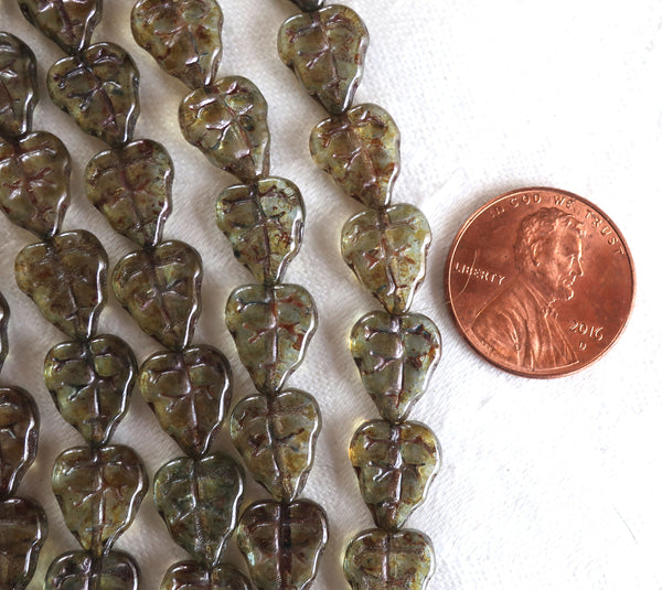 Lot of 25 Czech glass leaf beads, luster transparent dark green, earthy, rustic center drilled 8 x 10mm beads C5801 - Glorious Glass Beads