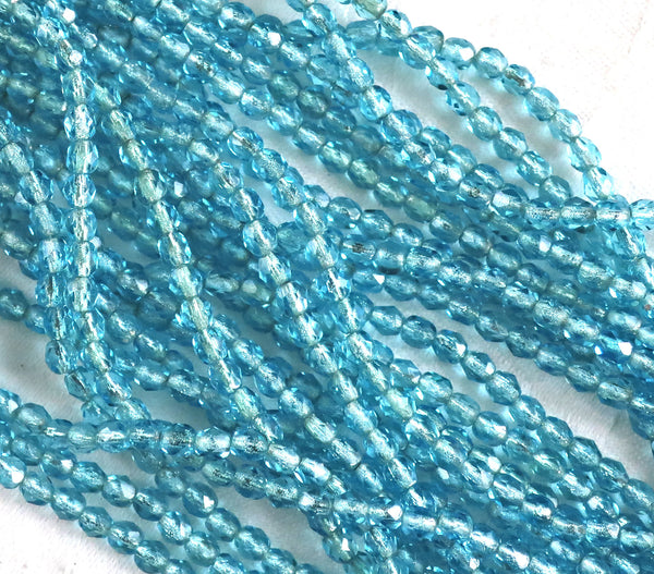 Lot of 50 4mm Aqua Blue silver lined Czech glass beads, Aquamarine firepolished faceted round beads C9601 - Glorious Glass Beads