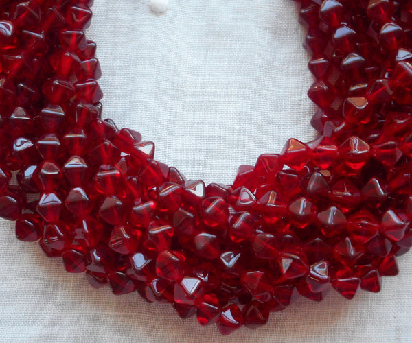 Fifty 6mm dark ruby red, garnet bicones, pressed glass Czech beads, C0082