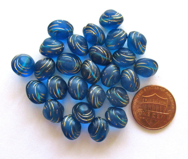 Lot of fifteen oval 10 x 9mm Czech glass snail beads - translucent capri blue and gold carved glass snail beads C12101