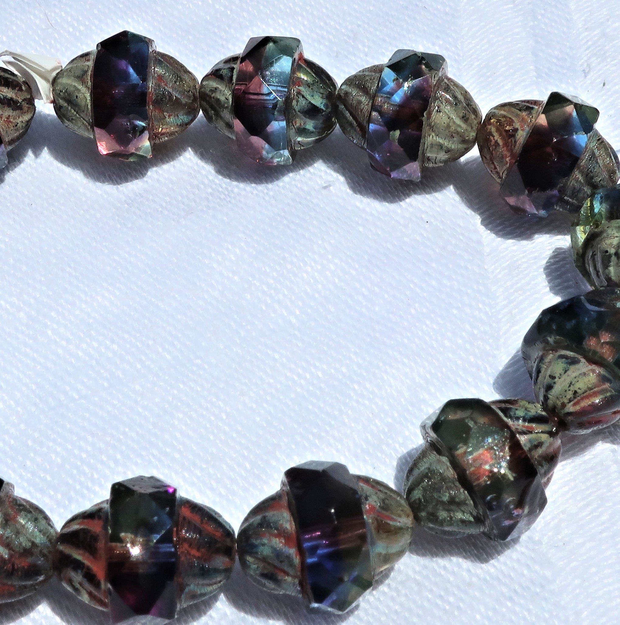 Ten Czech glass turbine beads - 11 x 10mm blue, purple / amethyst & green mix with a picasso finish C08101 - Glorious Glass Beads