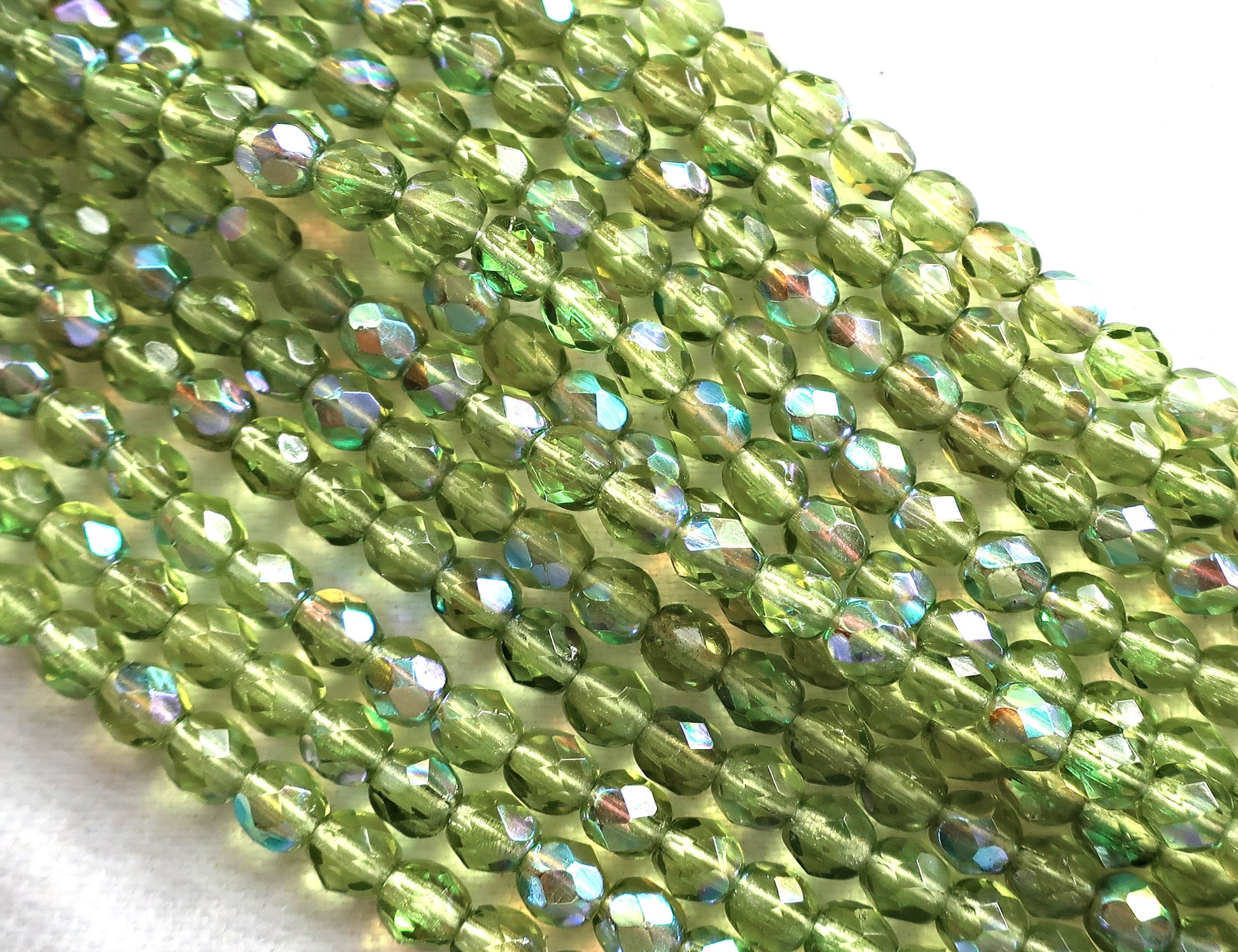Lot of 50 4mm Olive, Olivine Green AB Czech glass beads, firepolished, faceted round beads C8501 - Glorious Glass Beads