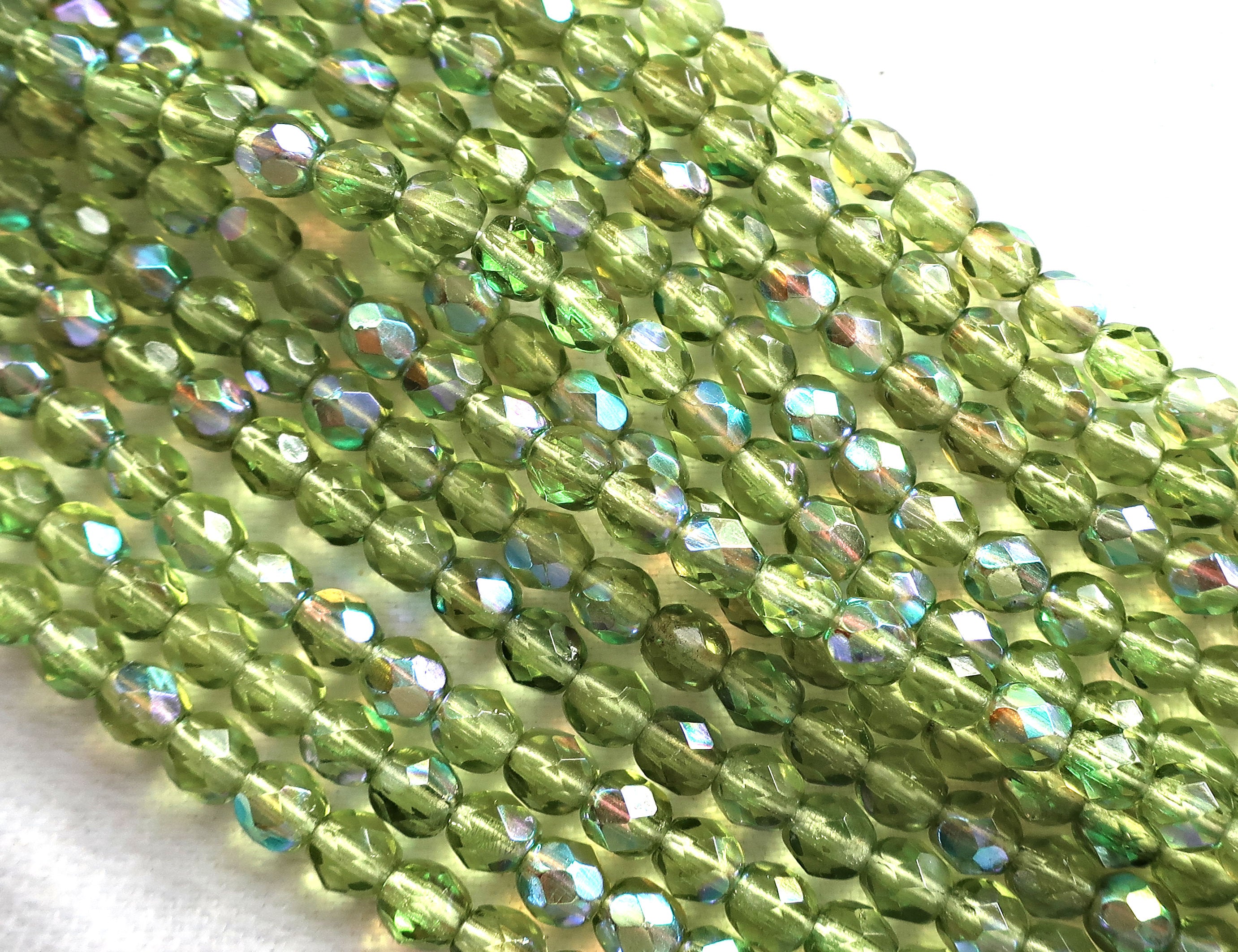 Lot of 50 4mm Olive, Olivine Green AB Czech glass beads, firepolished, faceted round beads C8501 - Glorious Glass Beads