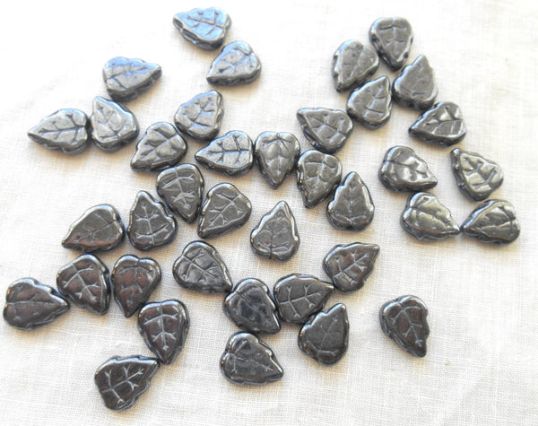 25 12 x 10mm Czech Hematite, metallic gray, center drilled, leaf beads, Czech glass beads C61125