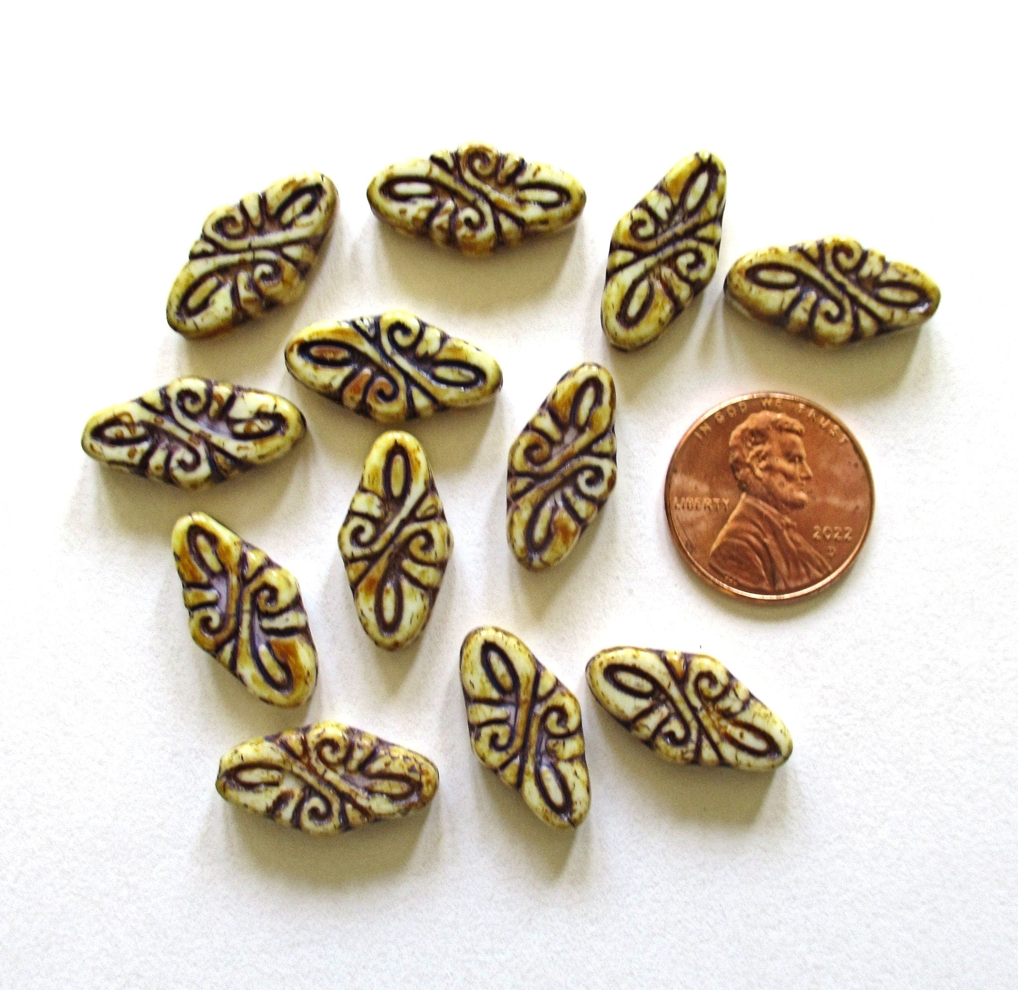 8 Czech glass arabesque beads - 9 x 19mm off white diamond shaped engraved beads with a full picasso coat & apurple wash - C0007