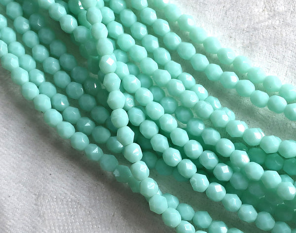 Lot of 50 4mm Opaque Pale Jade Green Czech glass beads, opaque light green faceted. firepolished round beads C8501 - Glorious Glass Beads