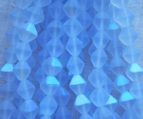 Fifty 6mm Matte Light Sapphire AB bicones, Iridescent blue pressed Czech glass bicone beads C8601