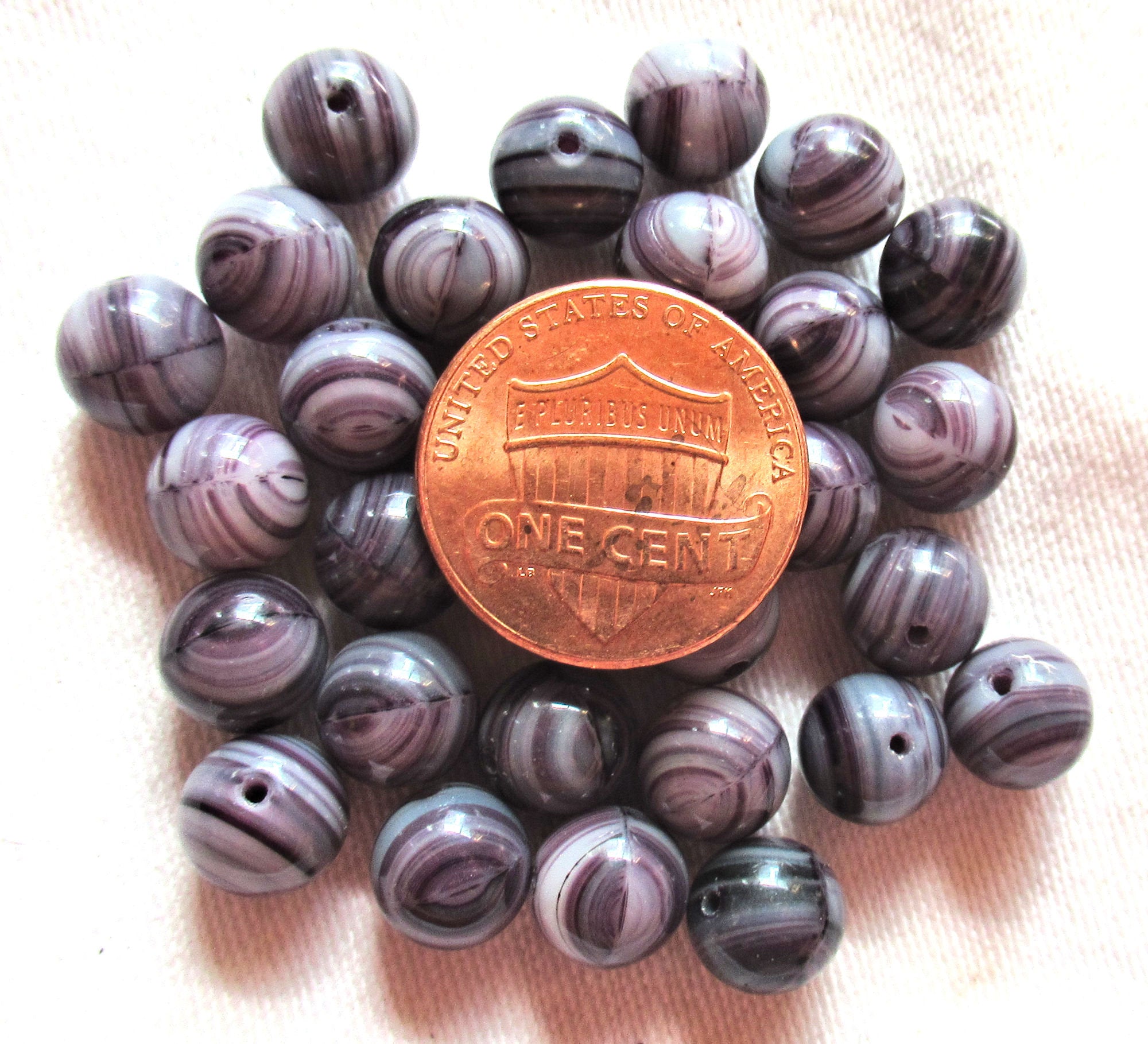 Lot of 25 8mm Czech glass druks - opaque amethyst or purple and white swirled glass - smooth round druk beads