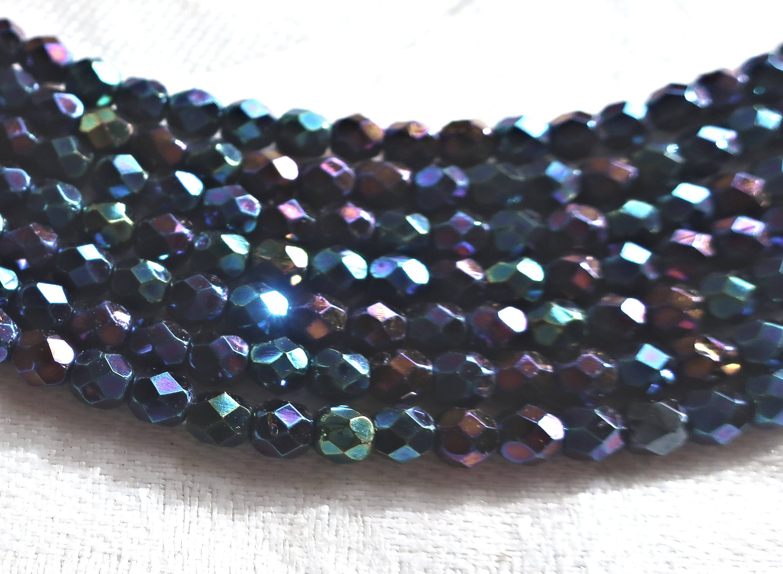 Lot of 50 4mm Blue Iris Czech glass beads, round faceted firepolished beads, C1650 - Glorious Glass Beads