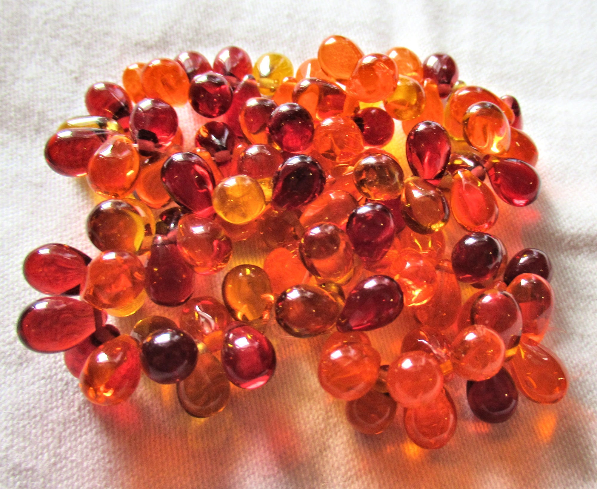 Lot of 25 Czech glass drop beads - transparent mix of red, orange and amber - smooth fire opal like teardrop beads - 9 x 6mm C60101