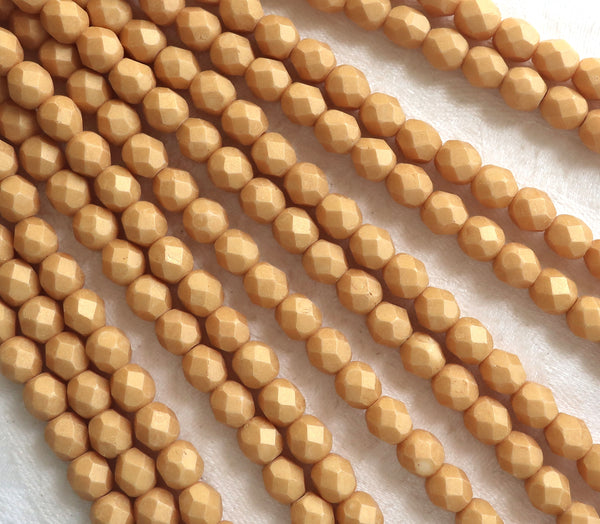 Lot of 25 6mm Czech glass druks, neutral opaque beige, yellow / gold Pacifica Ginger smooth round druk beads C8601 - Glorious Glass Beads