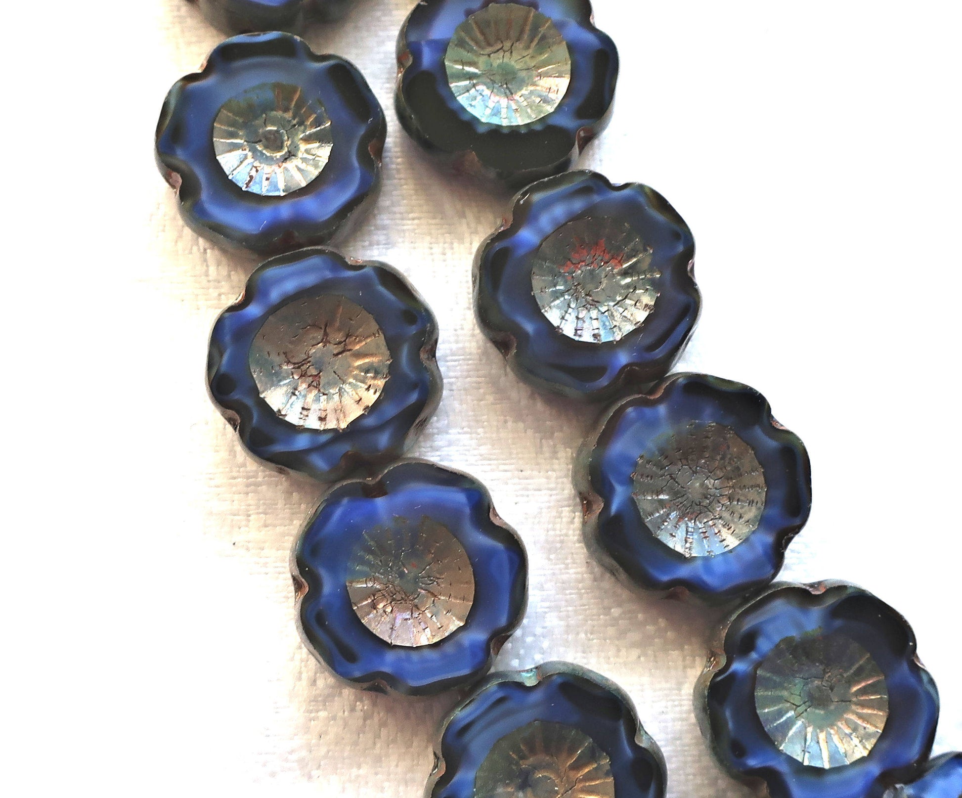 Lot of six 14mm table cut, carved, Czech glass flower beads. opaque, marbled satin, silk, midnight blue picasso Hawaiian flowers C80101 - Glorious Glass Beads