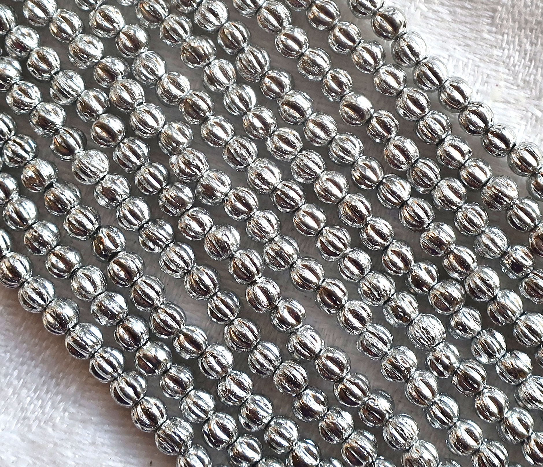 Lot of 100 3mm Czech pressed glass melon beads - Shiny Metallic Silver melon beads, C54101 - Glorious Glass Beads