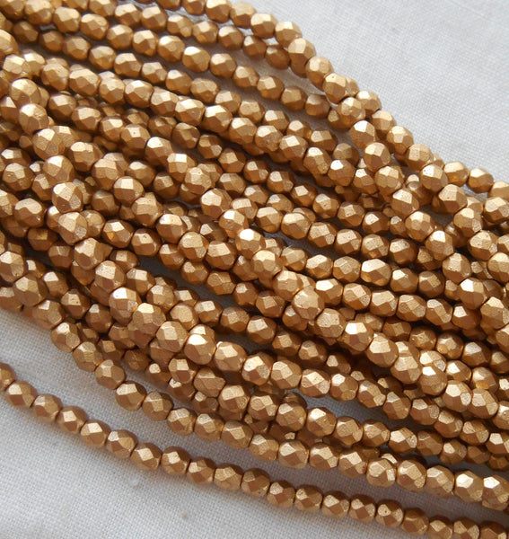 50 3mm Matte Metallic Gold Flax Czech glass beads, firepolished, faceted round beads C7550 - Glorious Glass Beads