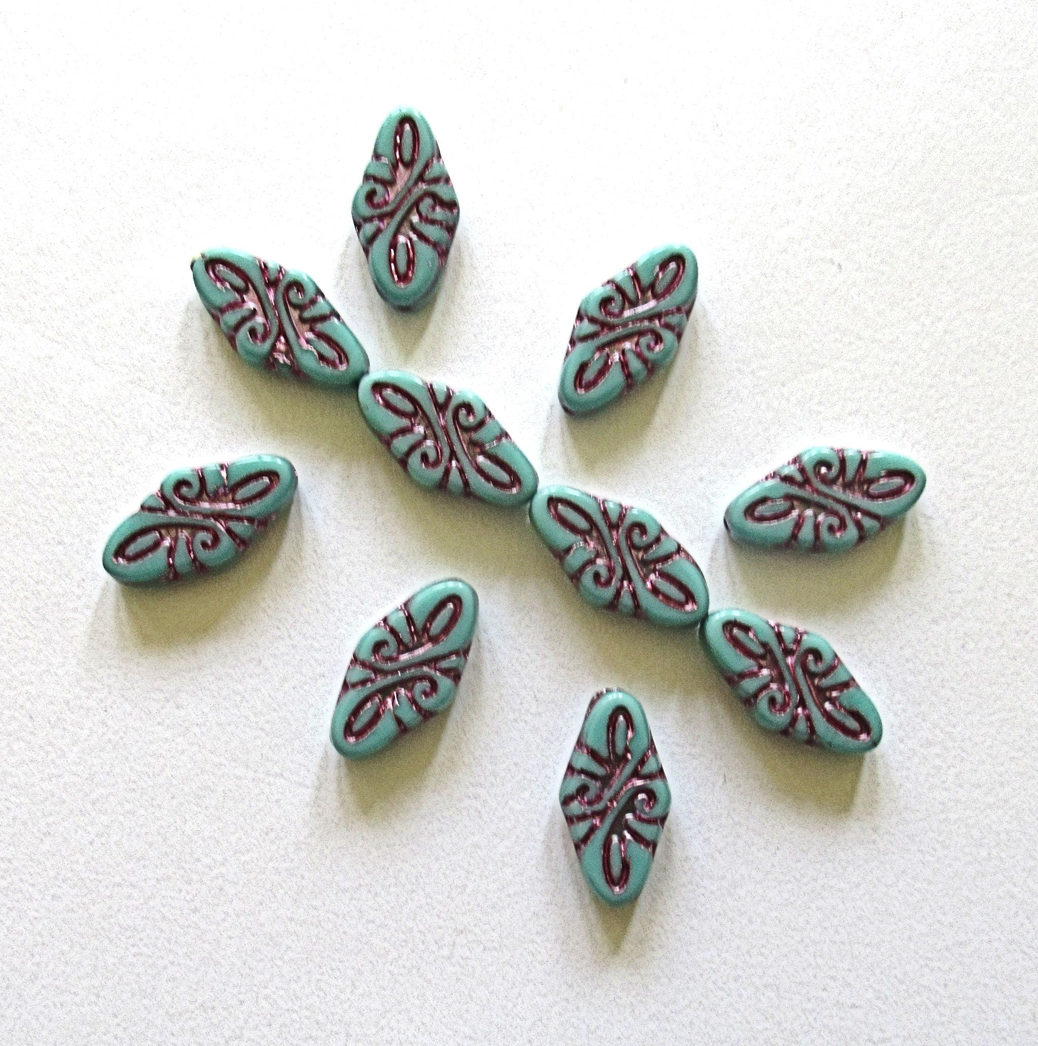 8 Czech glass arabesque beads - 9 x 19mm turquoise green diamond shaped engraved beads with a purple wash - C0049
