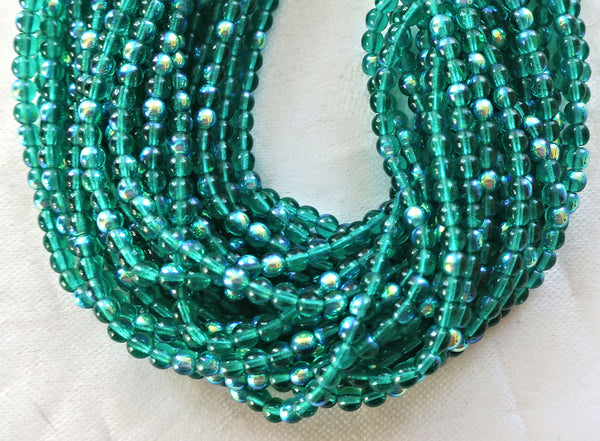 Lot of 100 4mm Emerald Green AB Czech glass druks, pressed glass round druk beads C7601 - Glorious Glass Beads