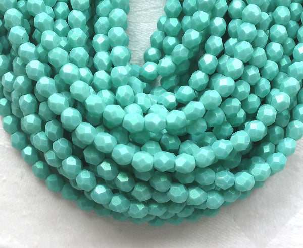 Lot of 50 4mm Opaque Aqua Glow Turquoise Czech glass beads, firepolished, faceted round beads, C3601 - Glorious Glass Beads