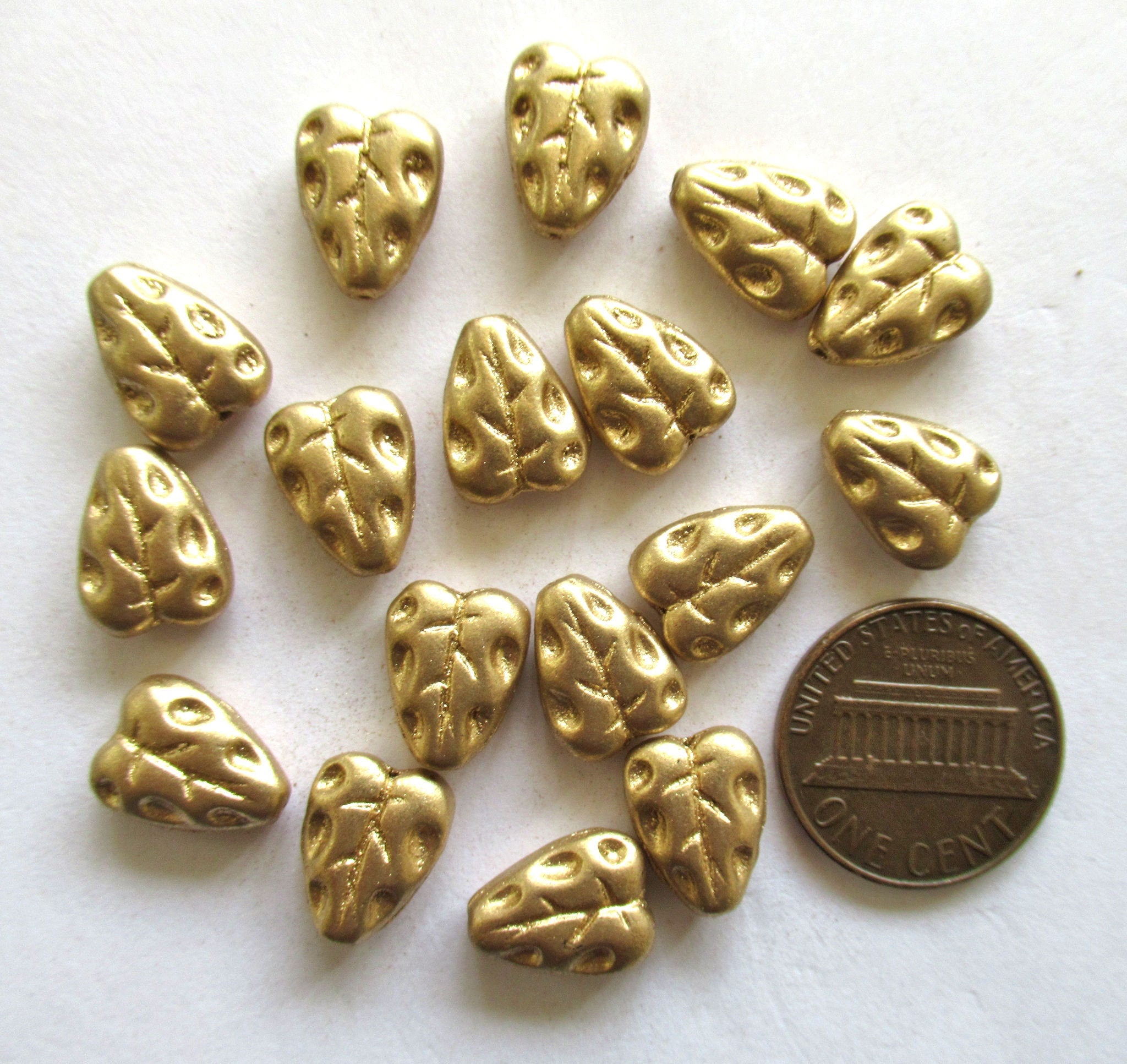 Twenty Czech glass leaf beads - 12 x 9mm matte metallic gold textured center drilled leaves - C00801