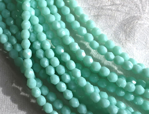 Lot of 50 4mm Opaque Pale Jade Green Czech glass beads, opaque light green faceted. firepolished round beads C8501 - Glorious Glass Beads