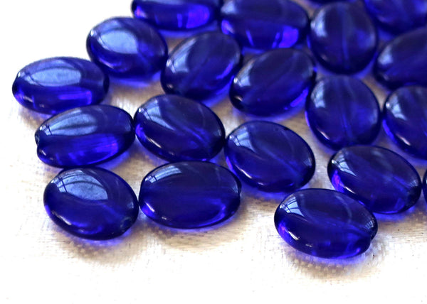 25 cobalt blue flat oval Czech Glass beads, 12mm x 9mm pressed glass beads C7525 - Glorious Glass Beads