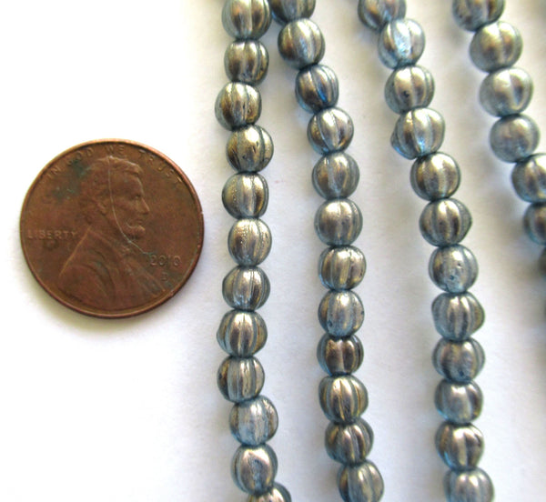Fifty 5mm Czech glass melon beads - Halo Shadows blue/gray beads with a gold finish - 00311