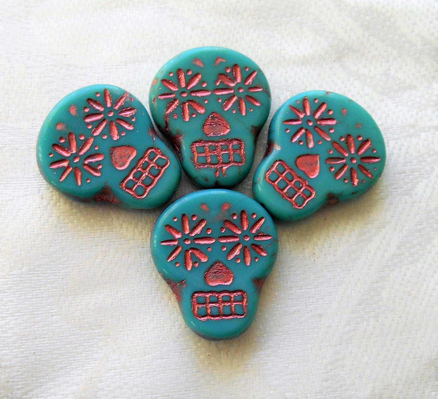 Four large turquoise blue & pink Czech glass skull beads, opaque turquoise blue glass with a pink wash, focal beads, 20mm x 17mm C02101