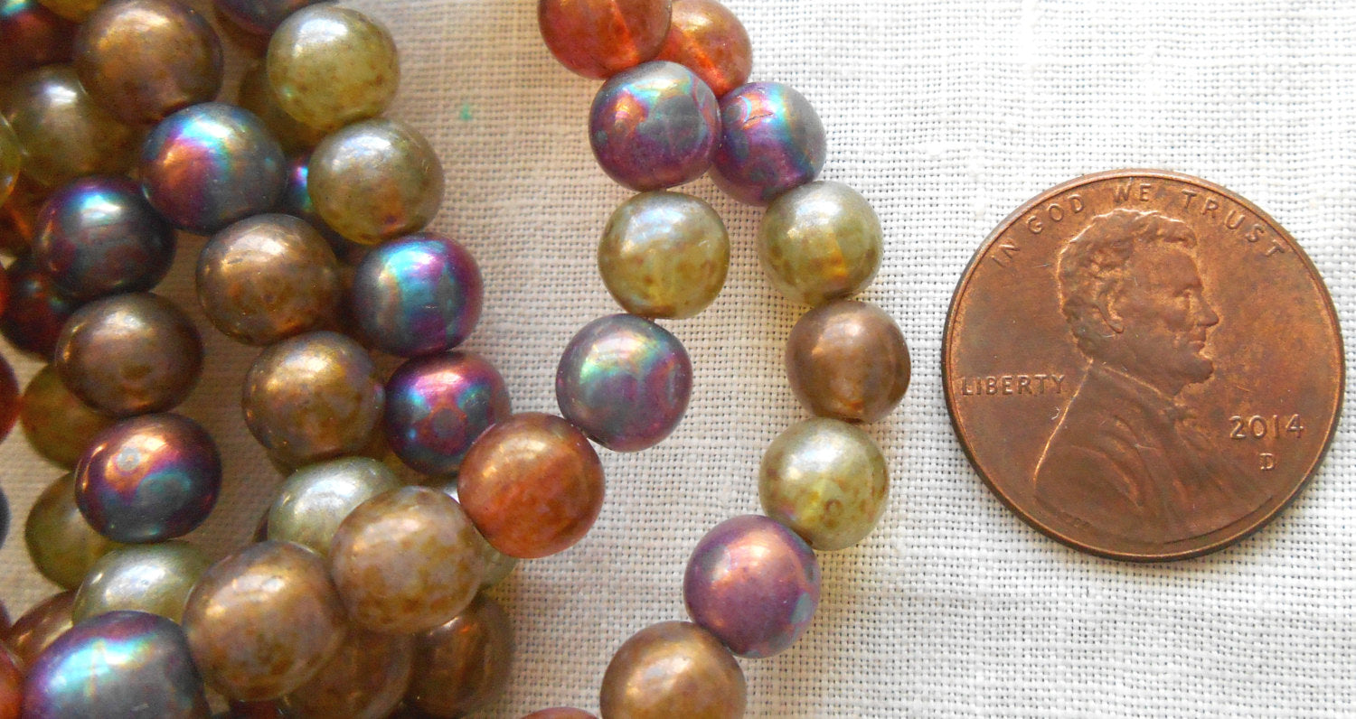 30 6mm Czech glass beads, earth tones mix, yellow, umber, purple, green etc. smooth round druk beads with an iridescent luster finish C2901