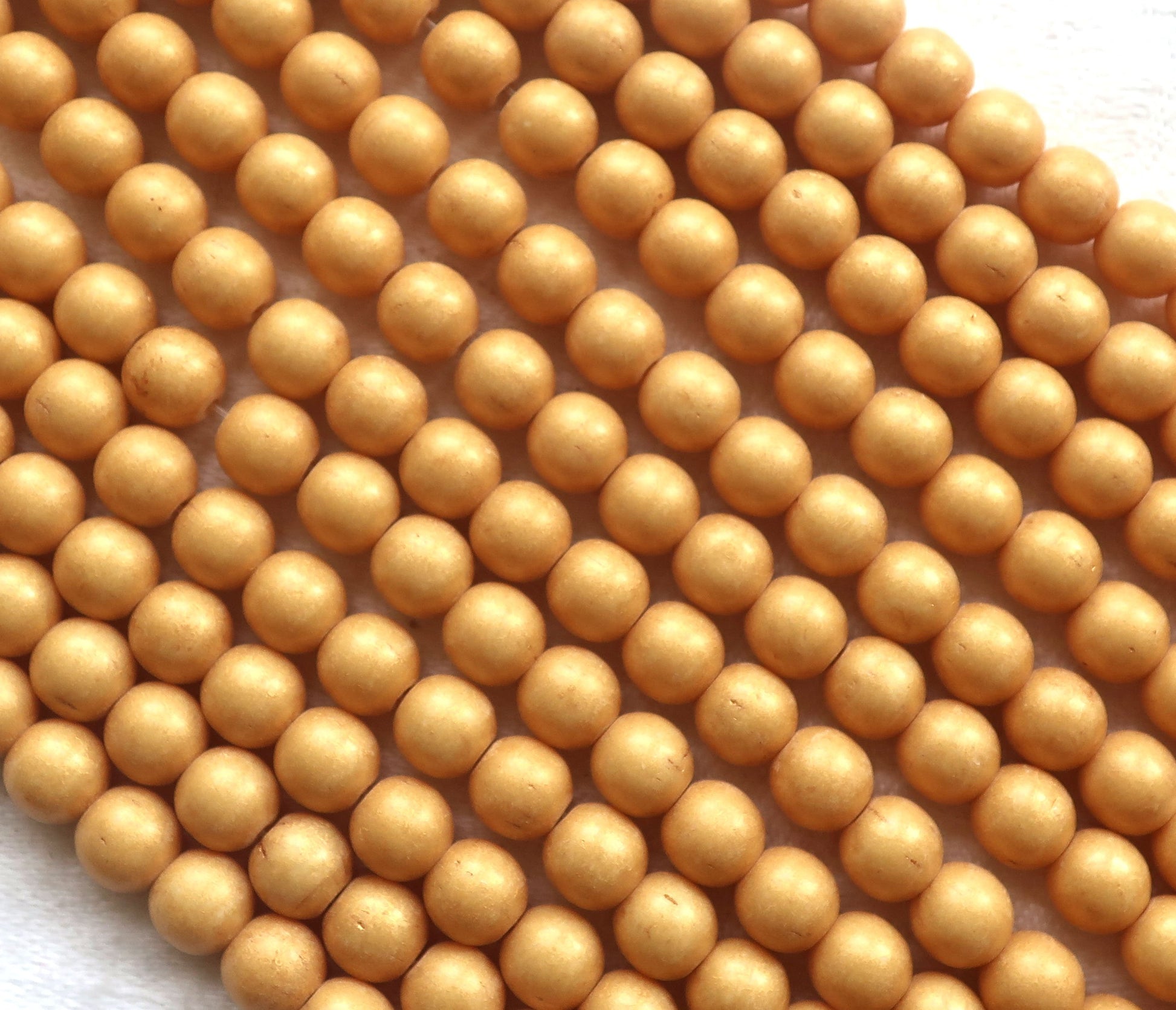 Lot of 50 6mm Czech glass druks, opaque beige, light brown, Pacifica Ginger smooth round druk beads 03150 - Glorious Glass Beads