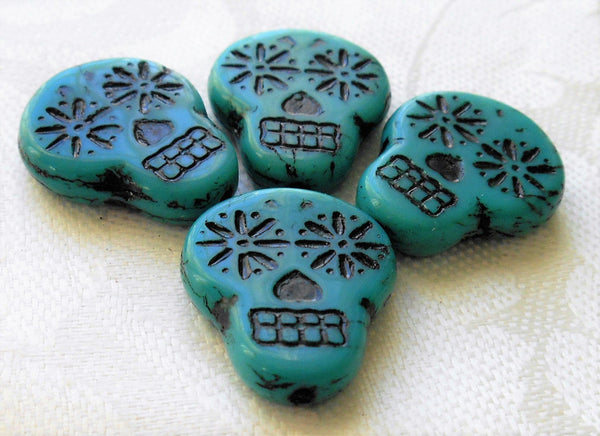 Four large turquoise blue & black Czech glass skull beads, opaque turquoise blue glass with a black wash, focal beads, 20mm x 17mm C02101